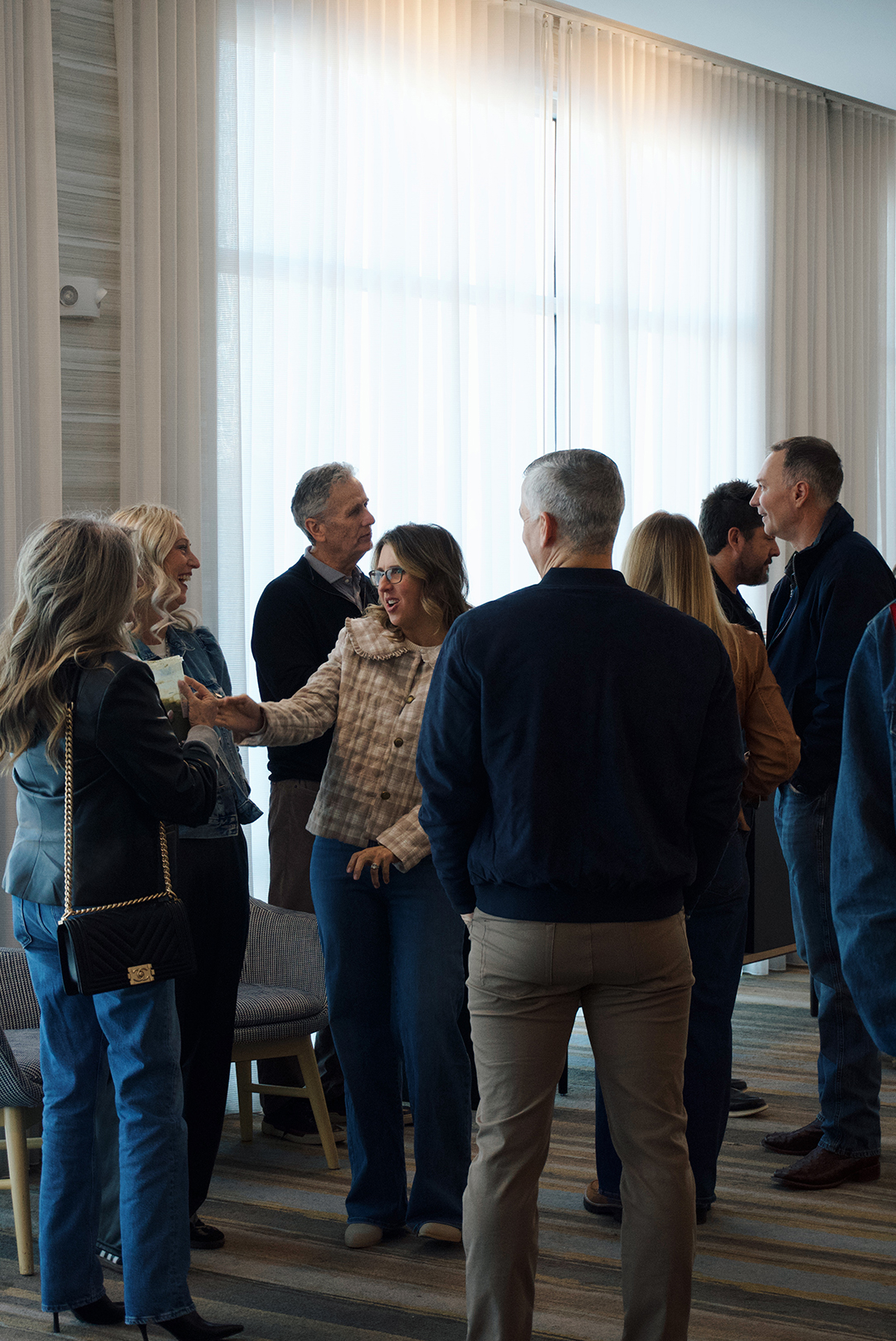 Members of Trinity City Church talking and connecting before service
